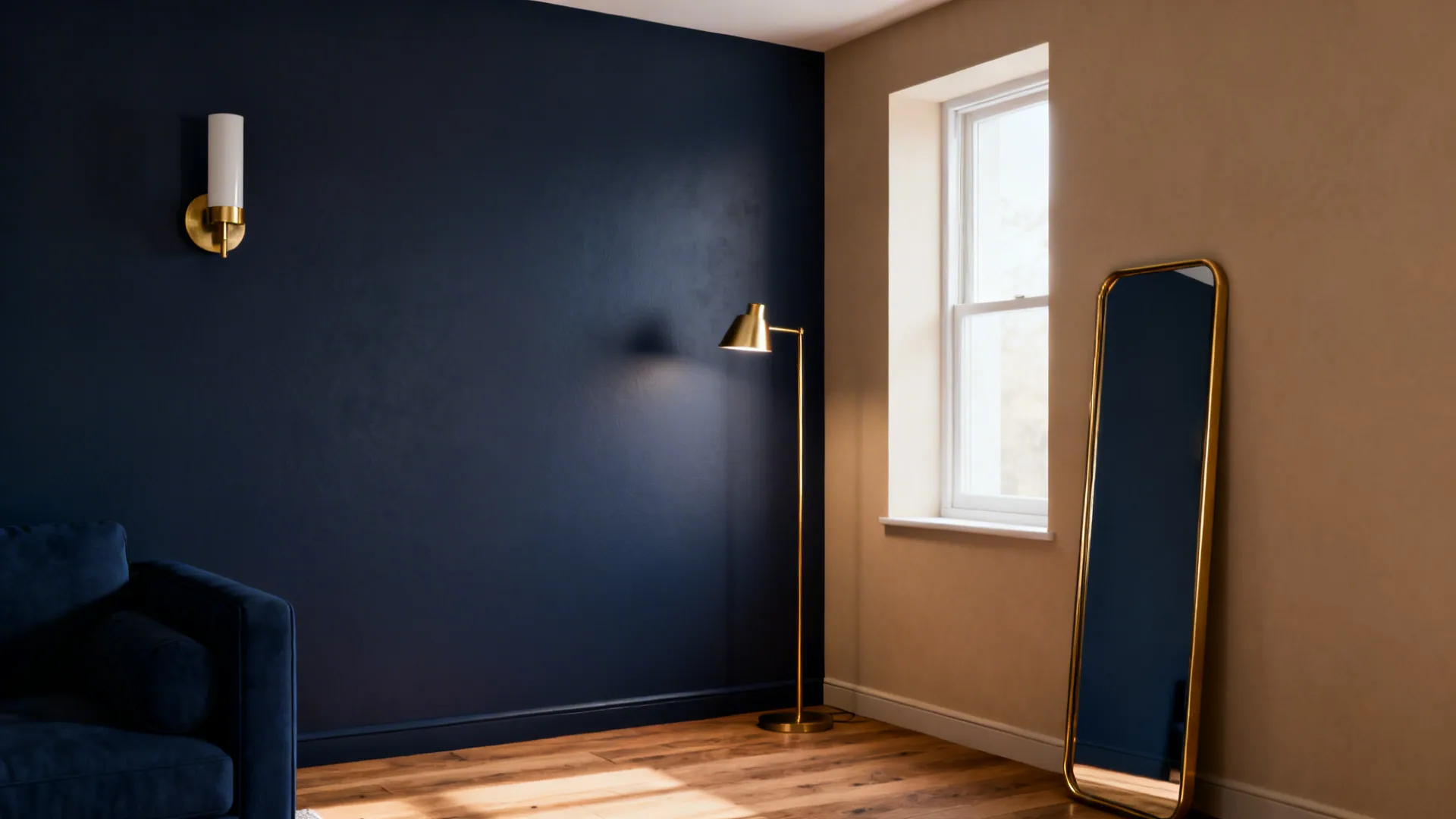 Navy painted feature wall in a small living room with layered lighting and a brass sconce