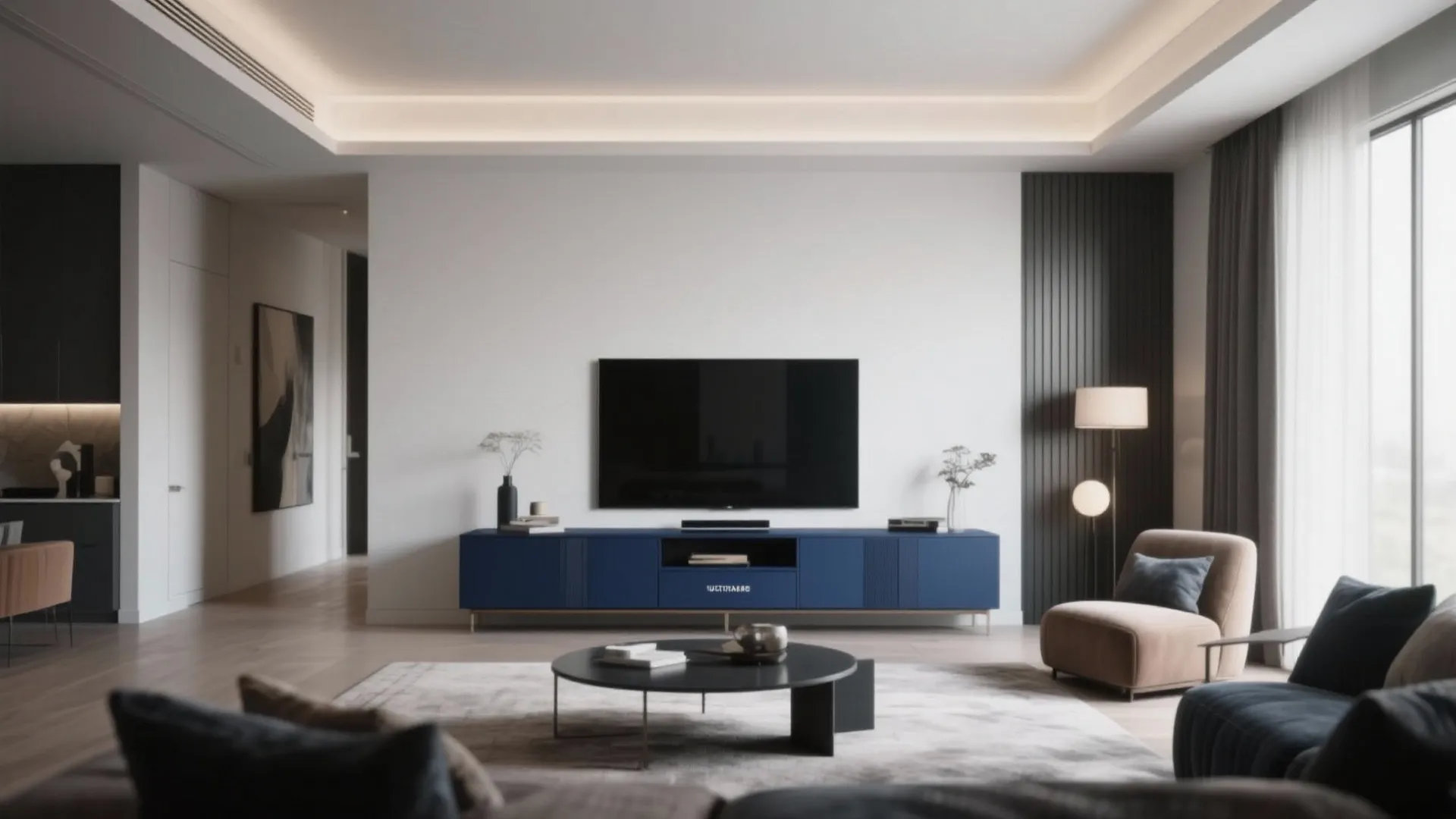 Modern living room featuring long blue cabinet flat screen television round black table and grey rug