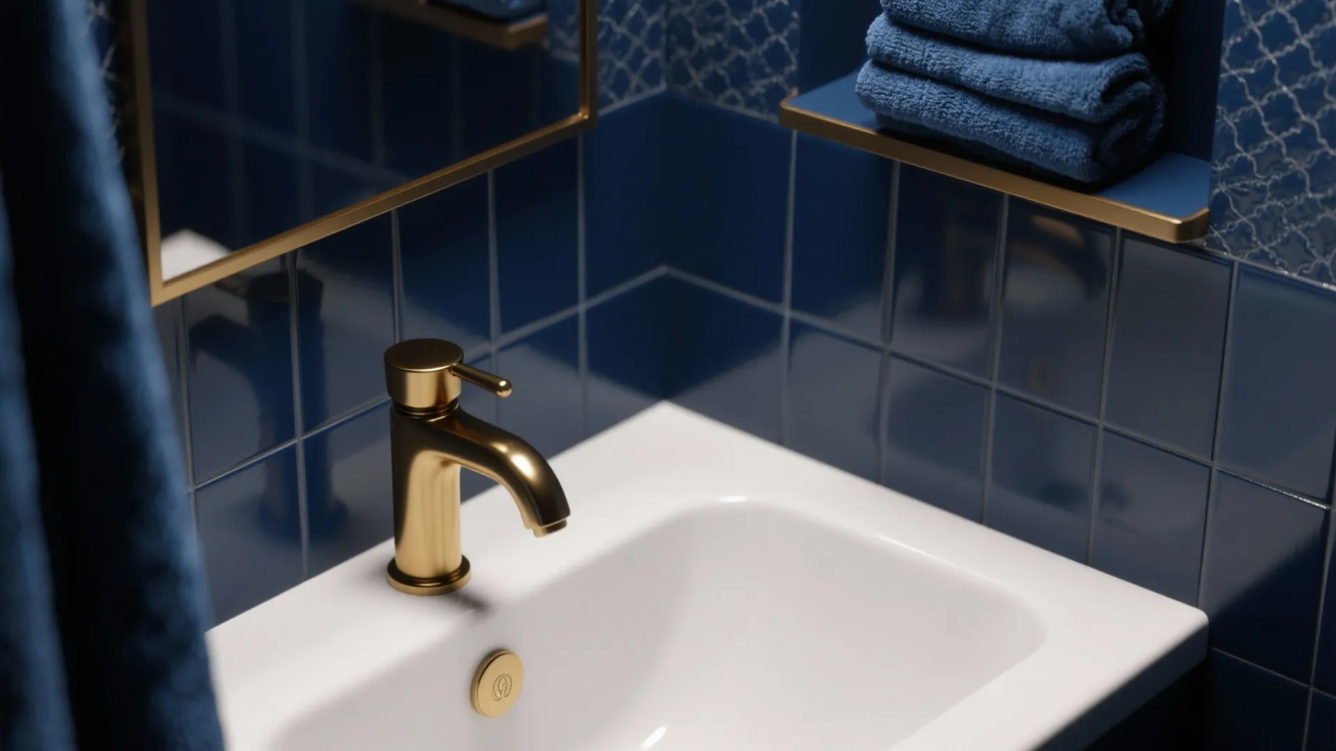 Small bathroom with deep navy accents and a polished brass two-tone faucet creating a hotel-like look