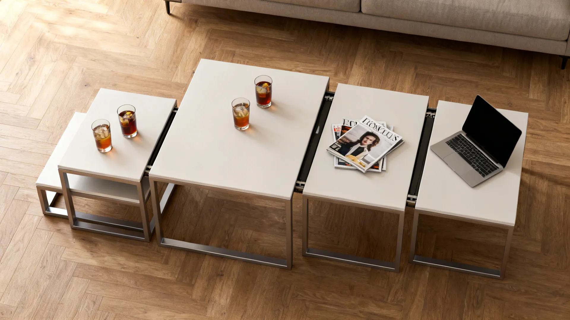 Top-down view of a nested 4-piece table set with some tables spread to form extra surfaces