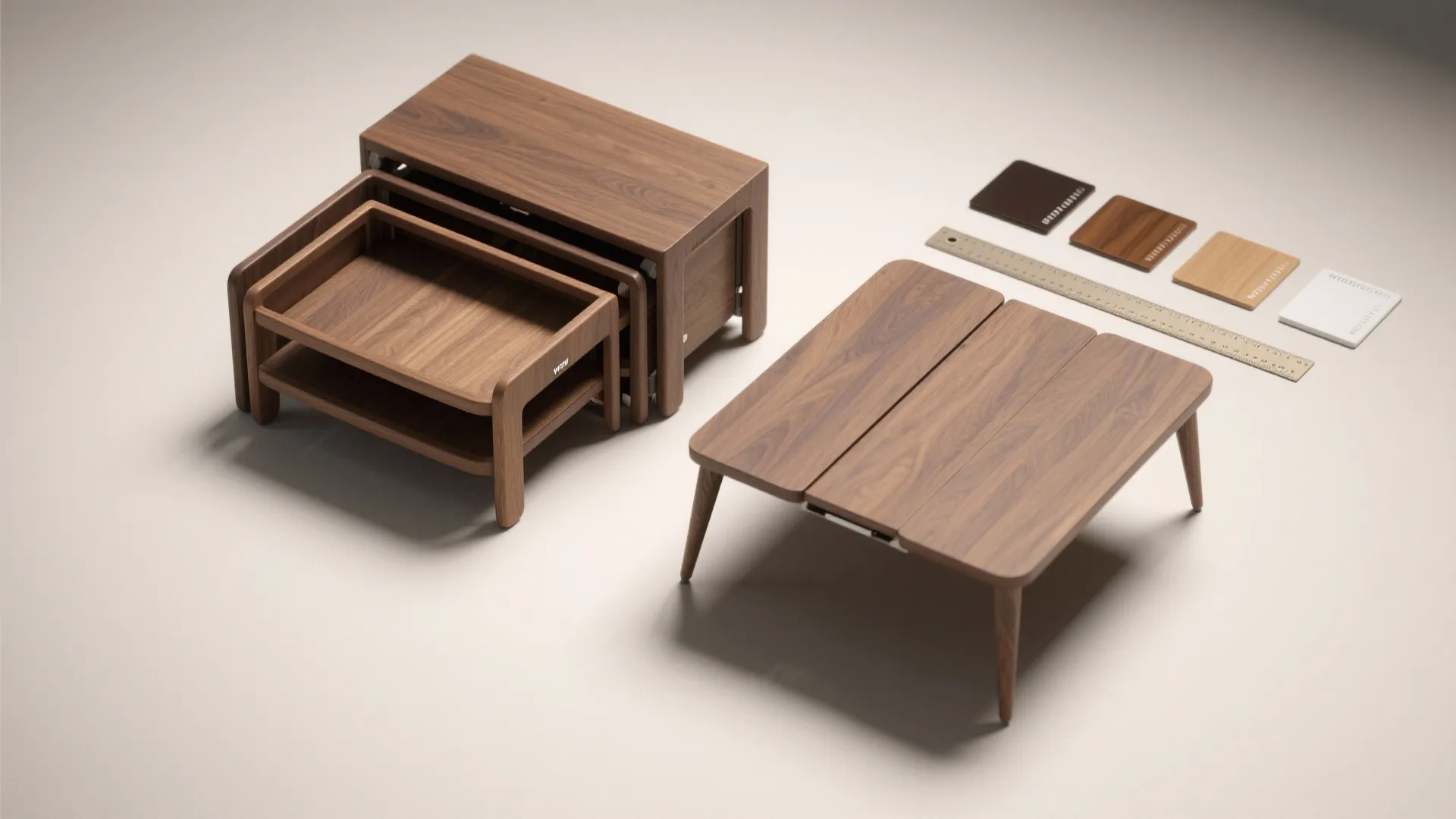 Modern wooden nesting tables set with square wood samples and a ruler on plain background
