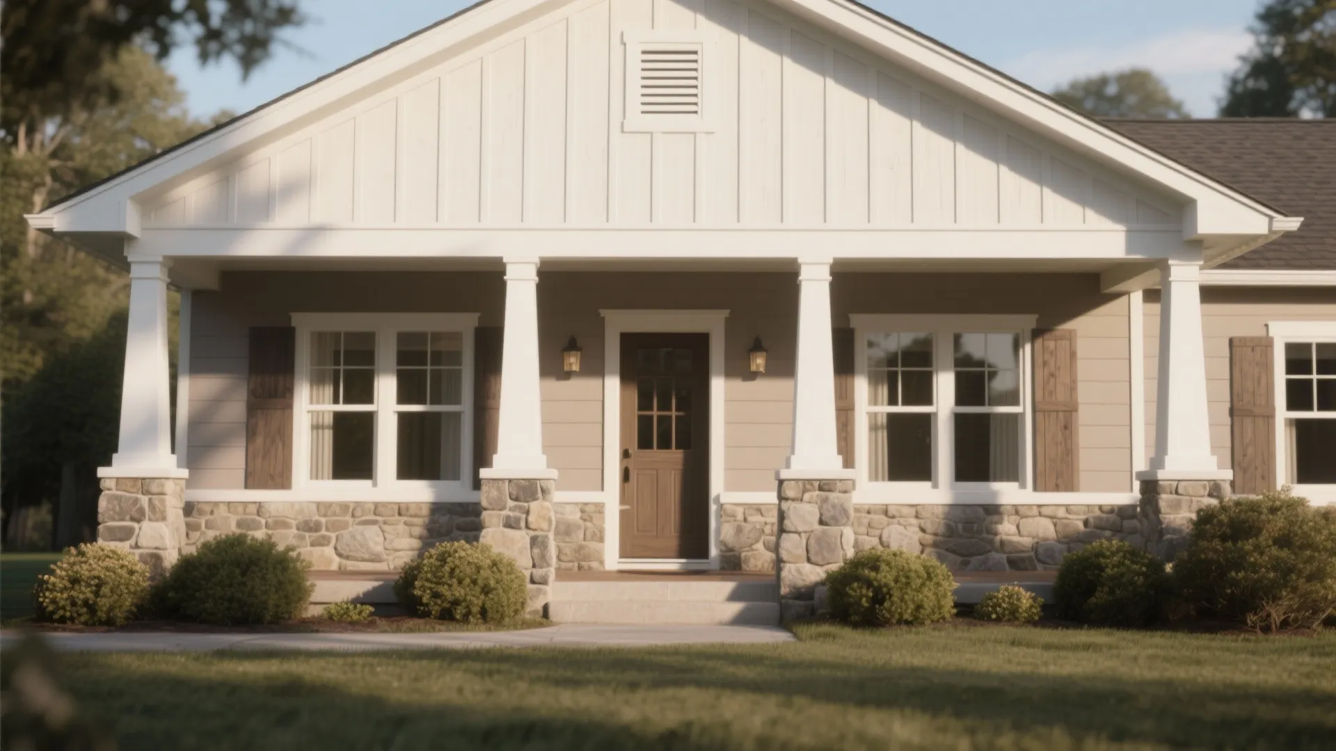 Modern farmhouse exterior featuring white siding stone wall brown front door porch columns and green bushes