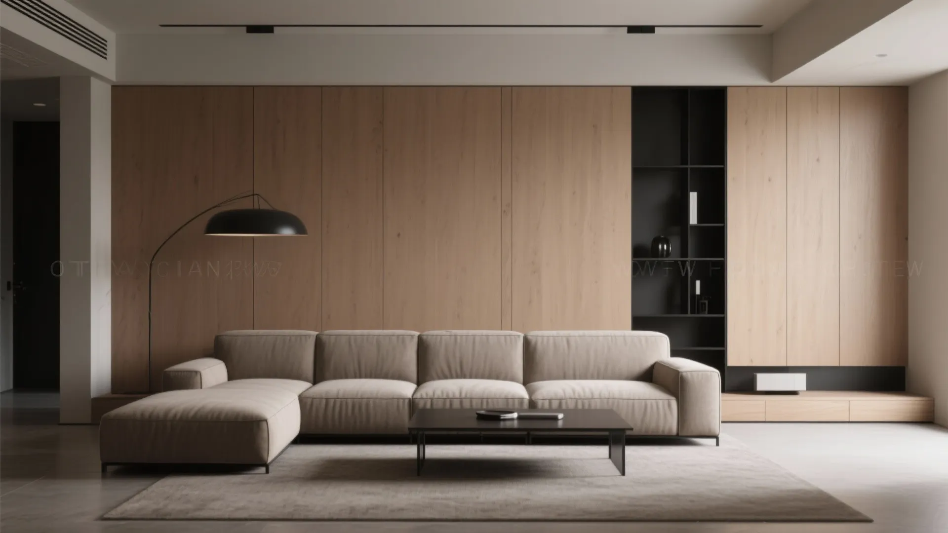 Minimalist living room with cool-leaning light brown walls, matte black details and low-profile furniture.