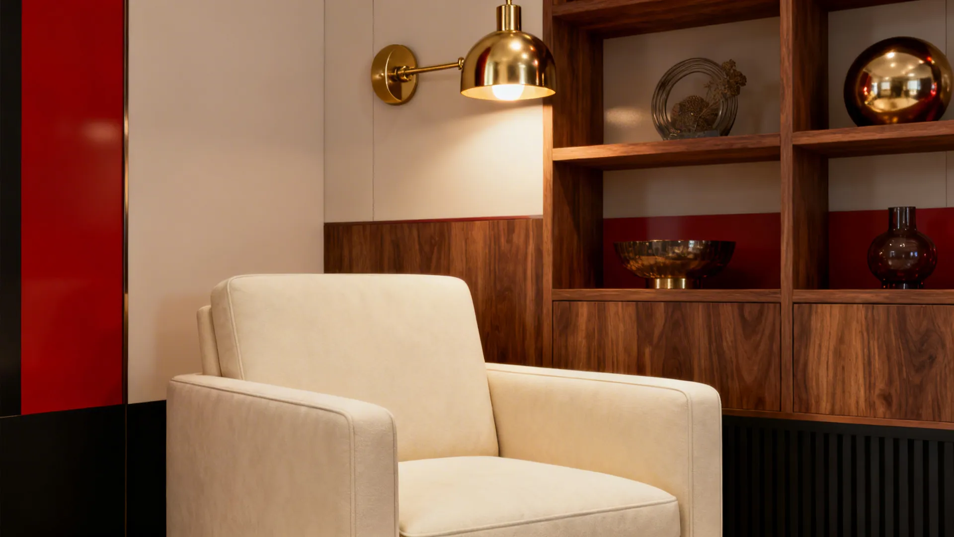 Cream armchair placed next to wooden cabinet with gold wall light and red wall panel