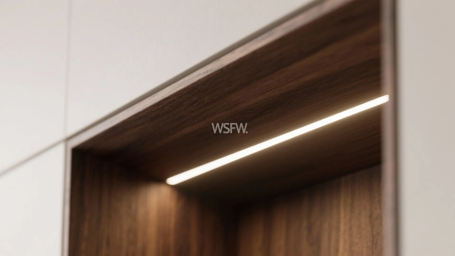 5) Recessed wall niches with integrated lighting for display and storage