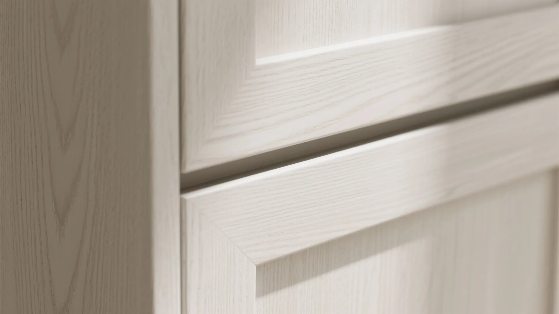 Macro close-up of rift-cut white oak cabinet door with seamless edge.