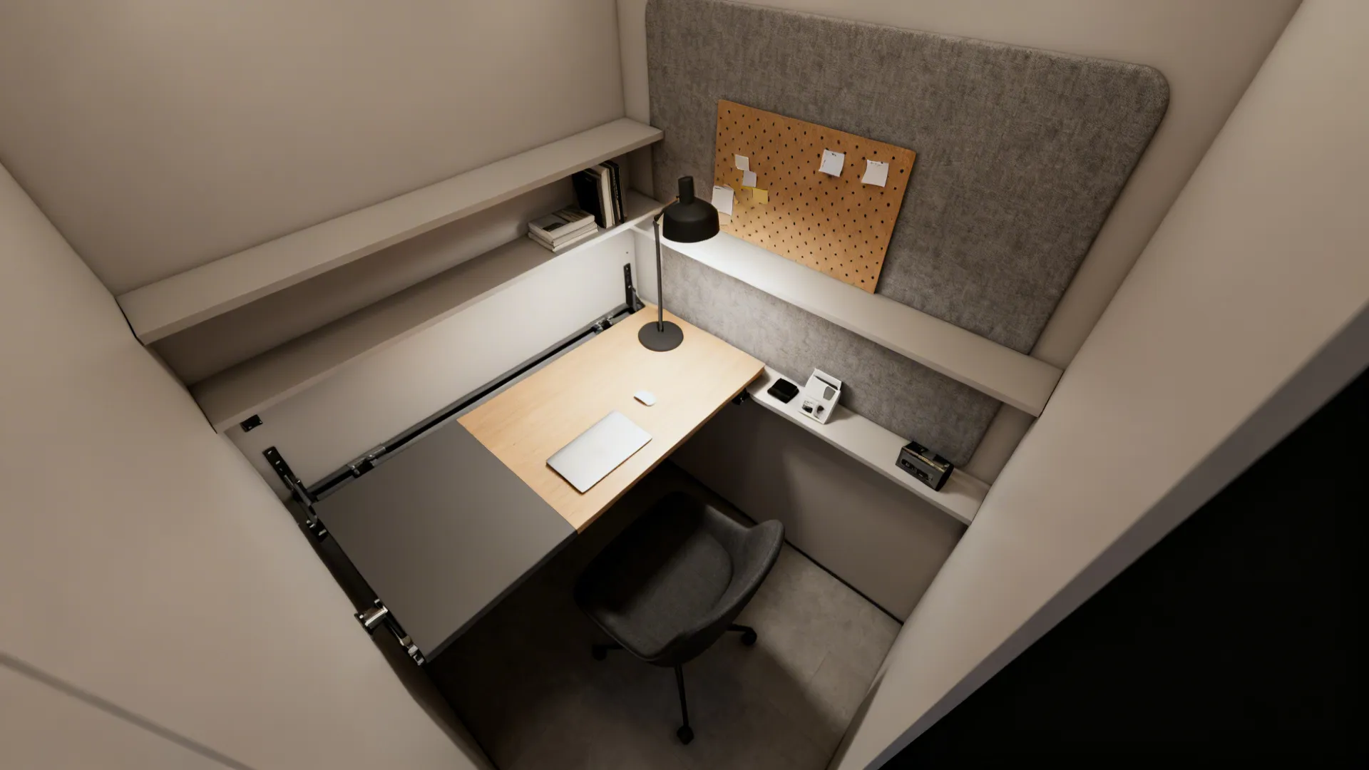 Top-down view of a compact home office alcove with fold-down desk and acoustic paneling