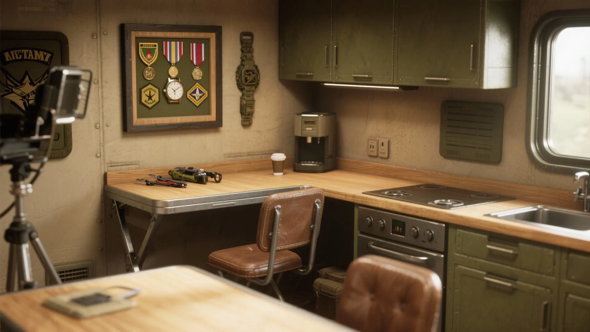 Small kitchen with green cabinets, wood countertop, coffee machine, framed medals, sink, and leather chair