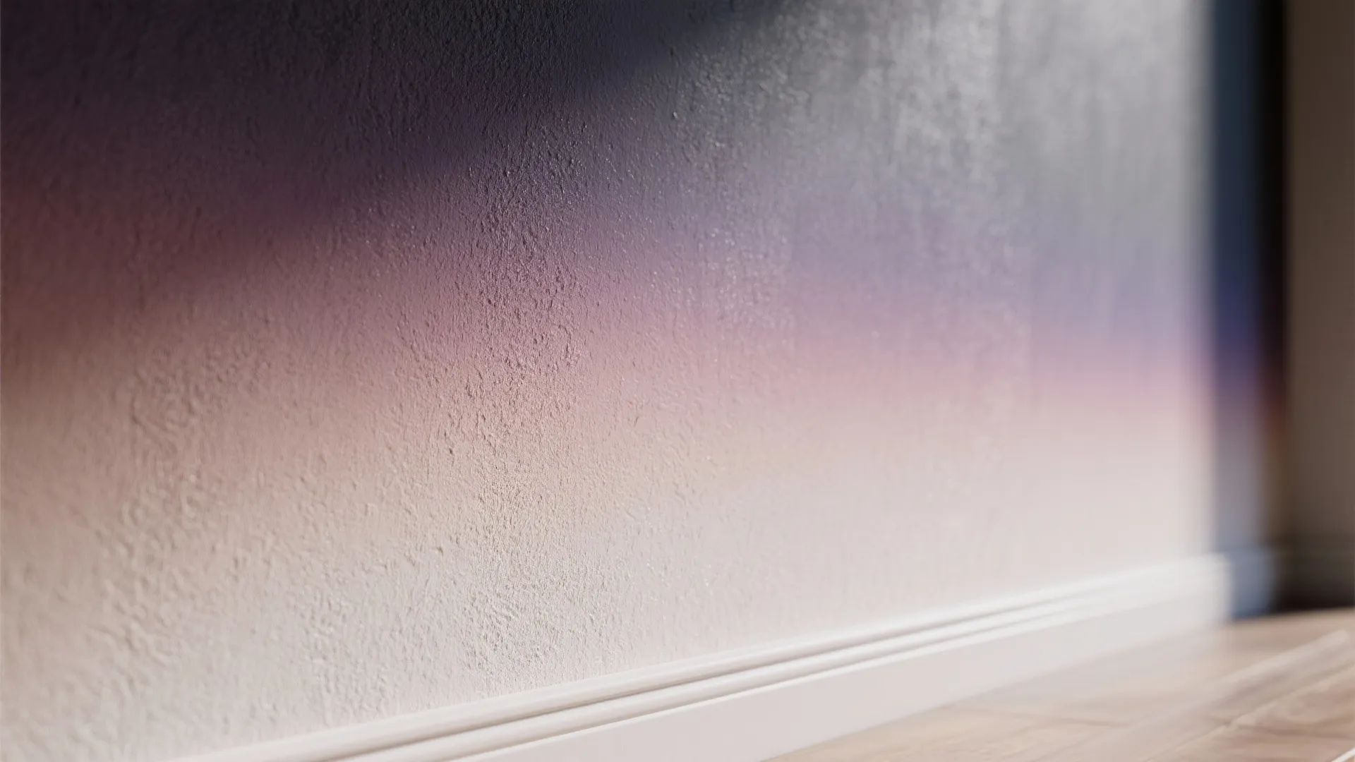 Close up of a wall with a purple and white gradient effect near wall panel