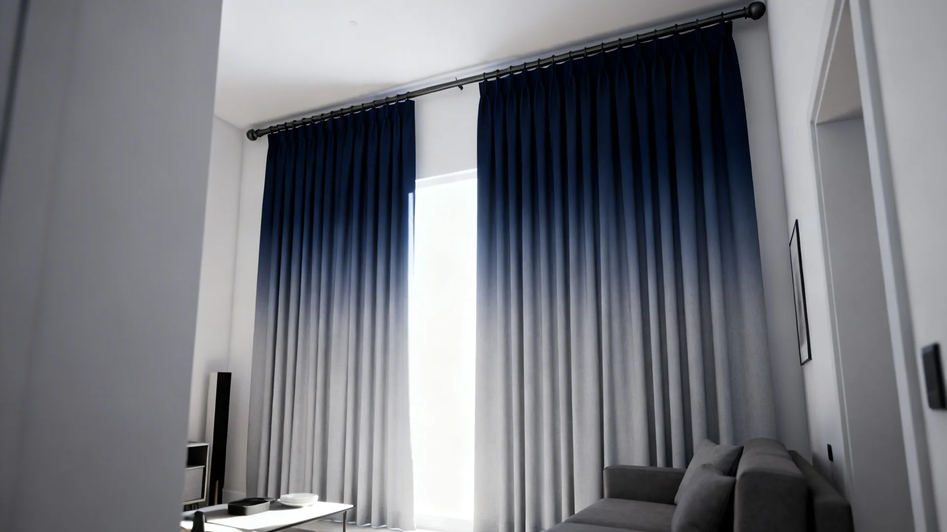 Living room with an ombre curtain panel from navy to pale grey hung high to create vertical drama and perceived height.