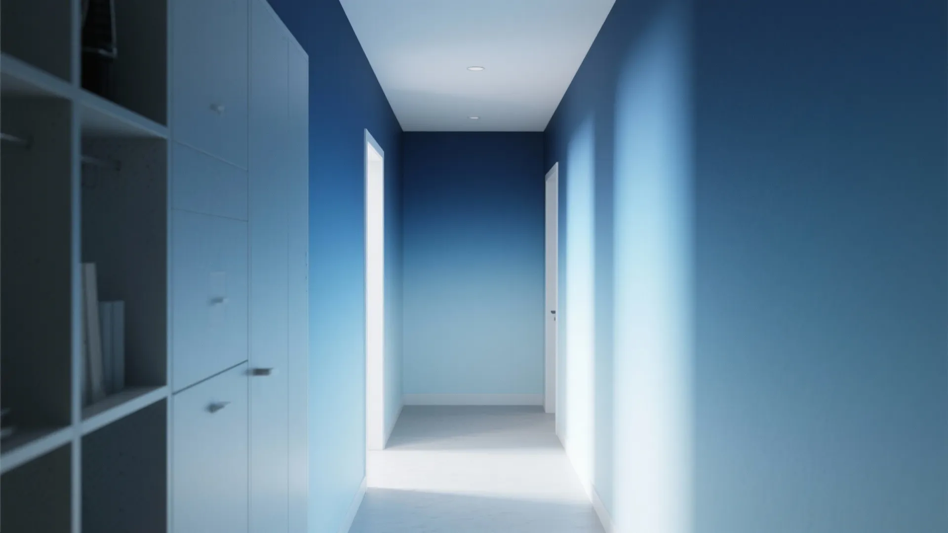 Long hallway with blue ombre painted walls, white storage cabinet, and bright natural indoor lighting