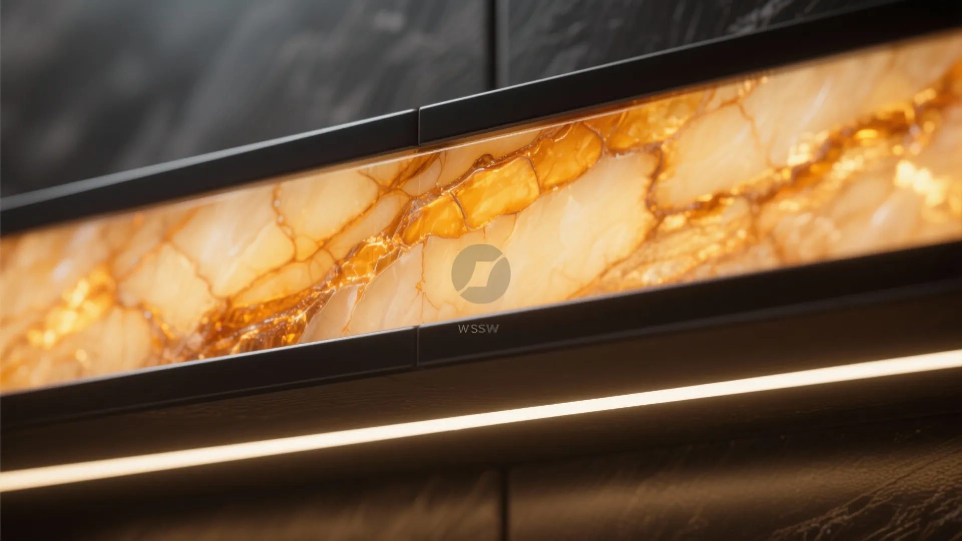 Close up of a backlit stone panel with gold veins set into a black cabinet