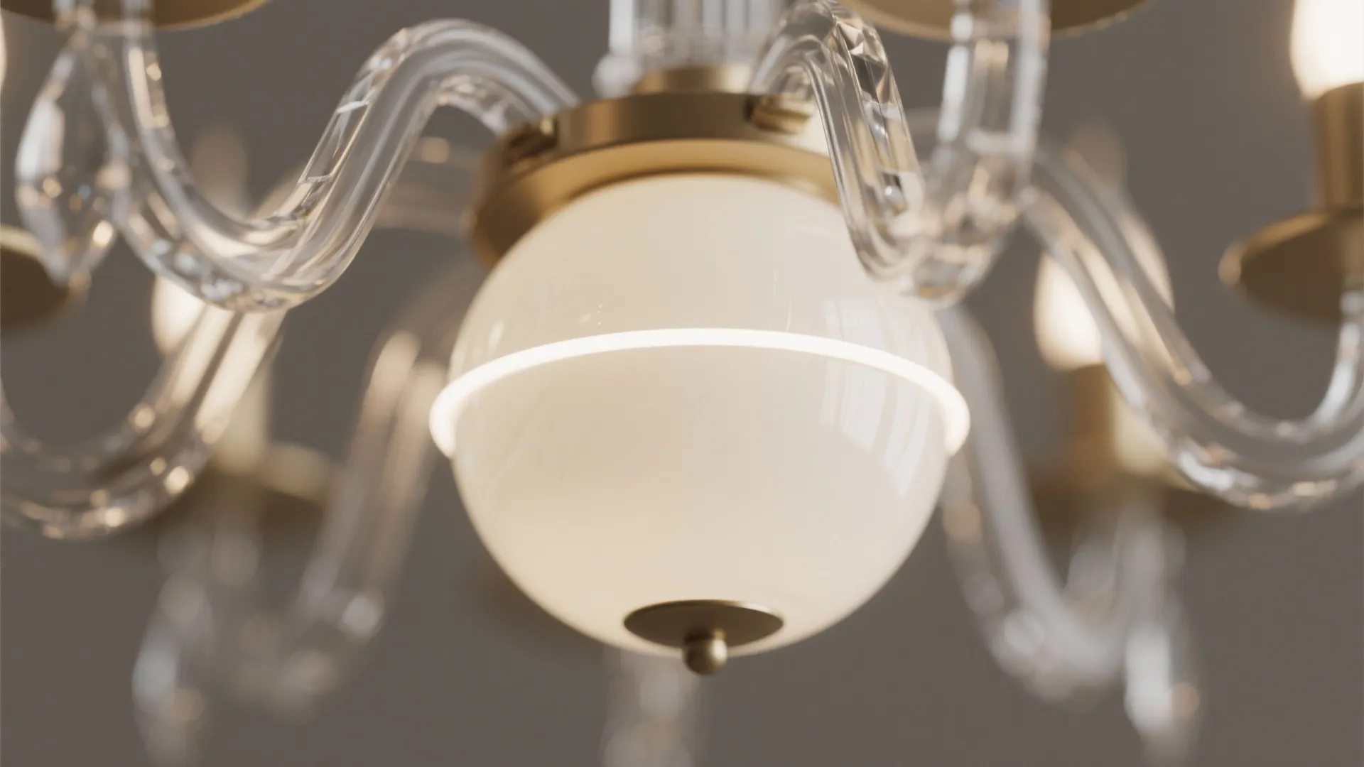 Macro detail of opal glass globe and prismatic acrylic with soft diffused LED glow.