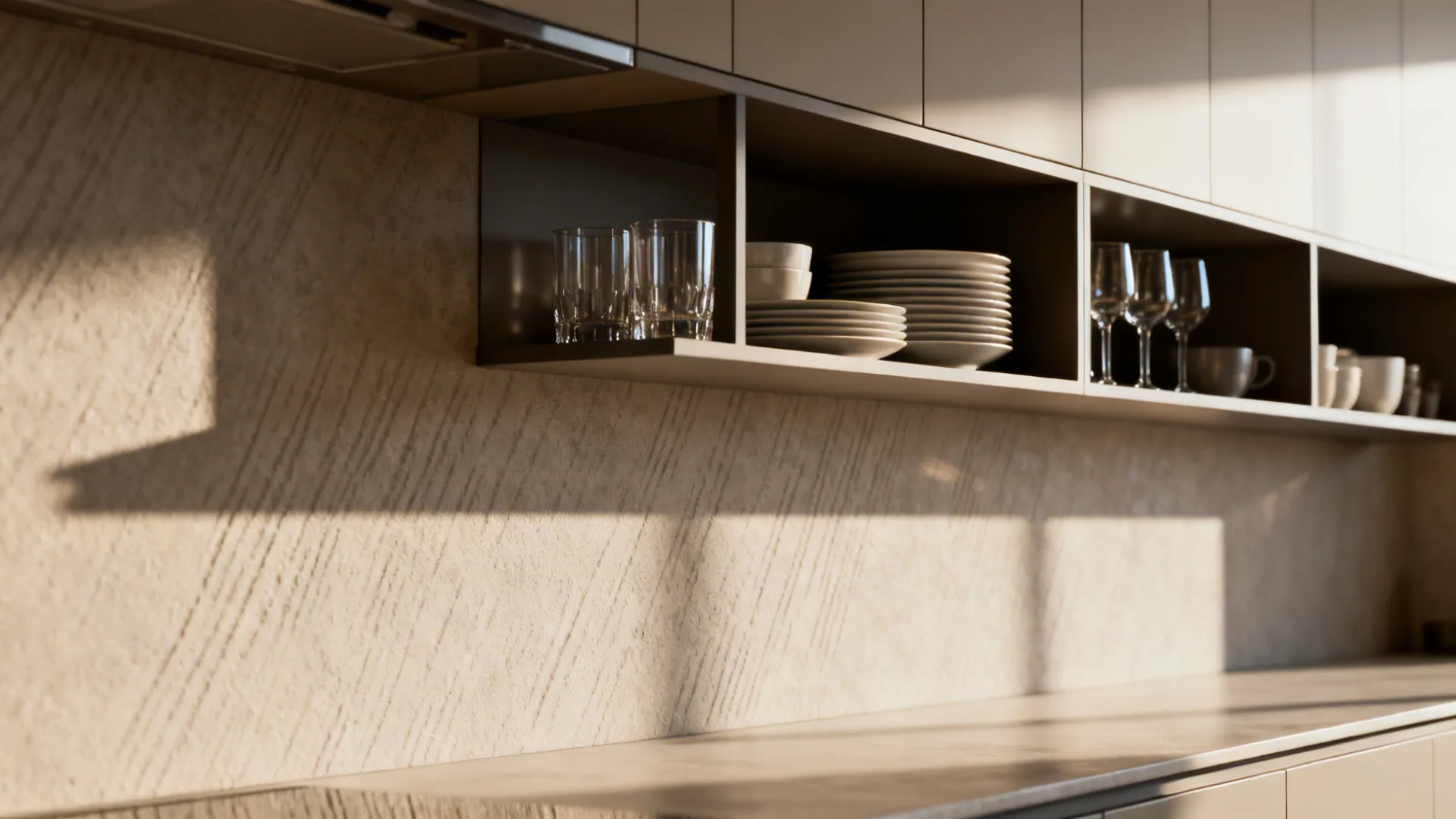 Floating open shelves with neatly arranged dishes above a continuous countertop in a small kitchen.