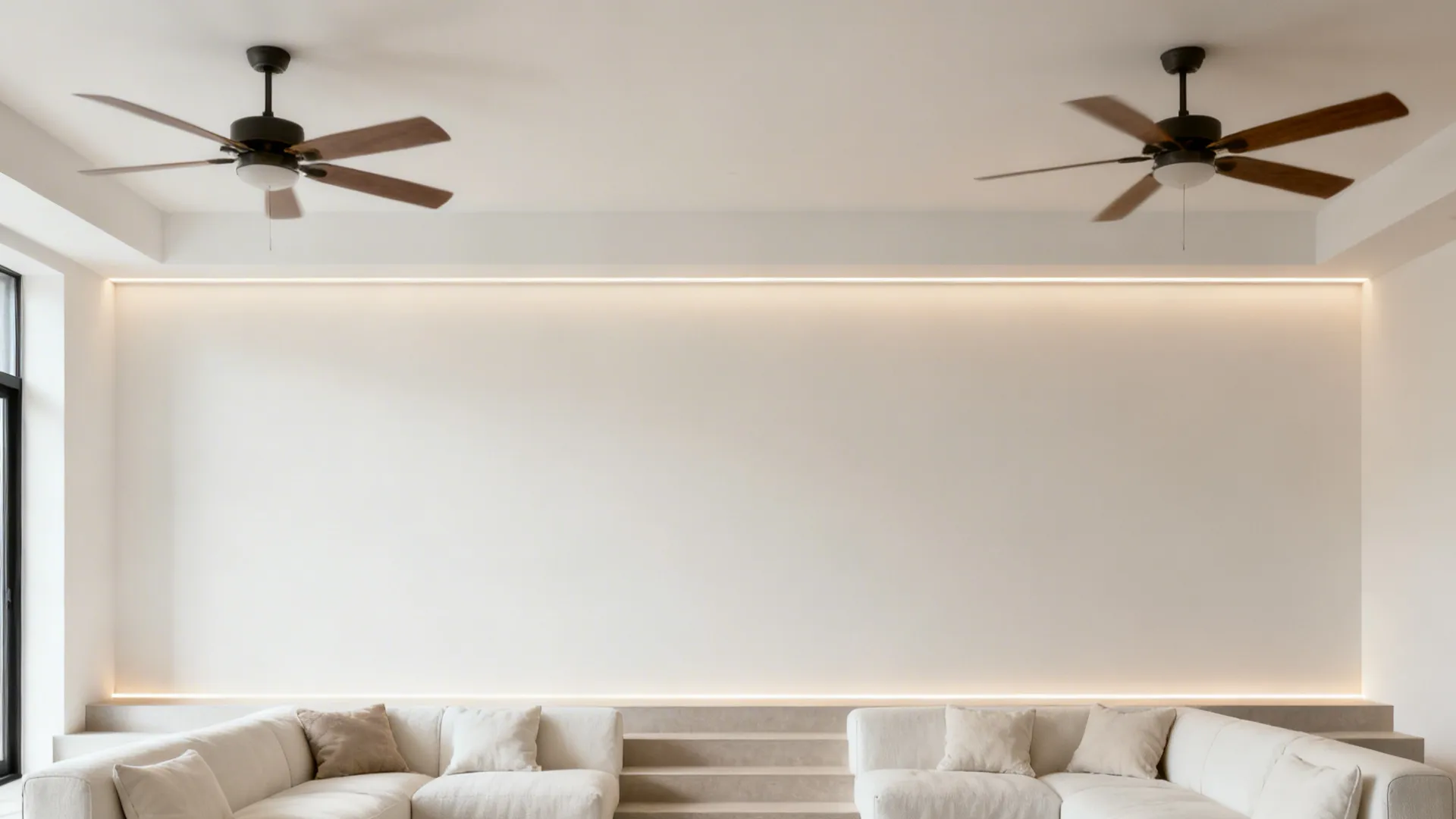 Painted ceiling zone with a subtle micro-border unifying two ceiling fans over seating.