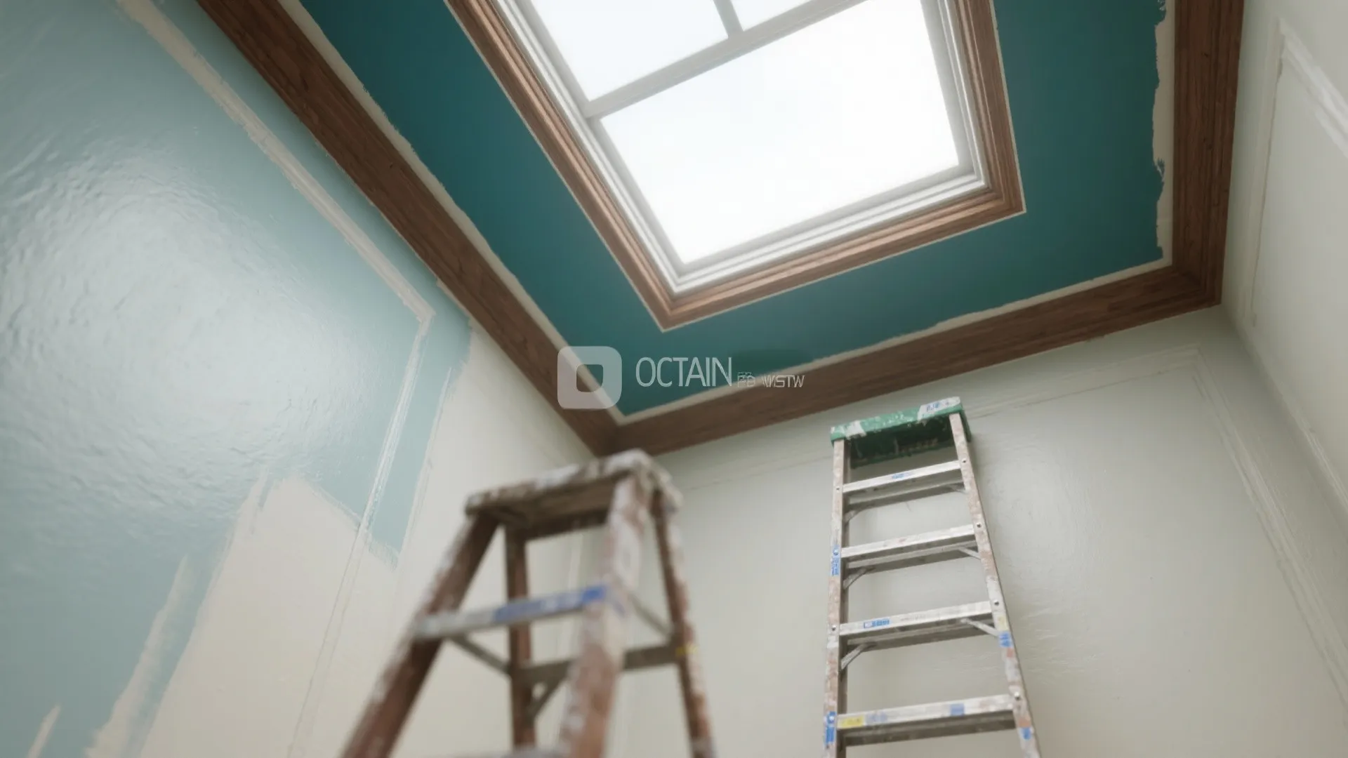 Interior painting process with teal paint on ceiling around a roof window and two metal ladders