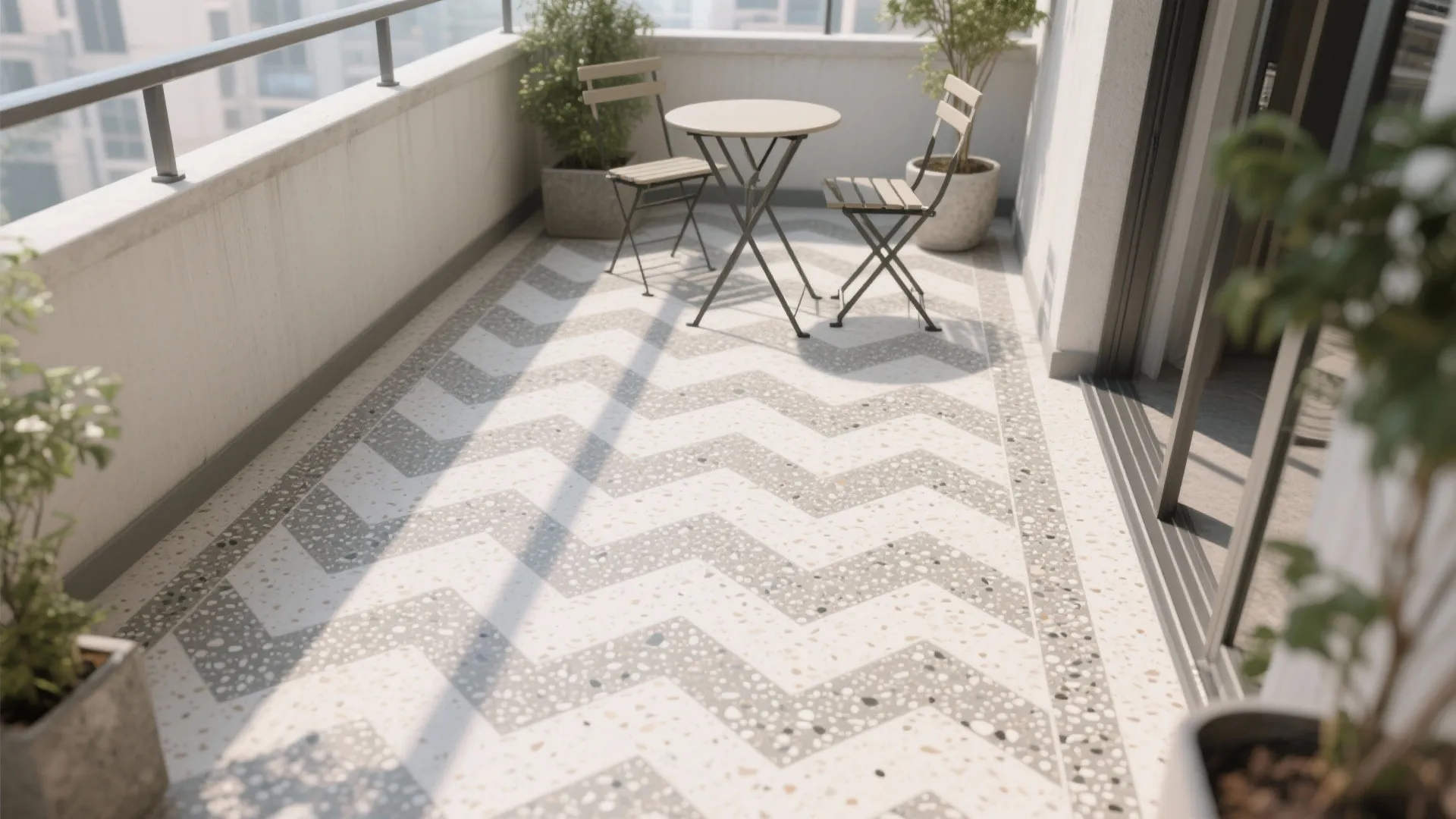 Modern balcony featuring grey and white zigzag pattern floor tiles with small table and chairs