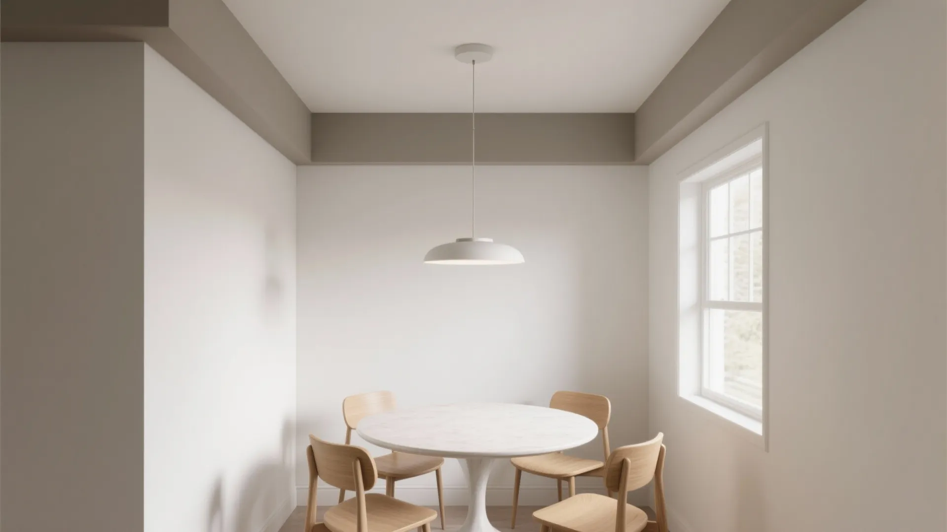Minimalist dining area with white round table four wooden chairs ceiling light and side window
