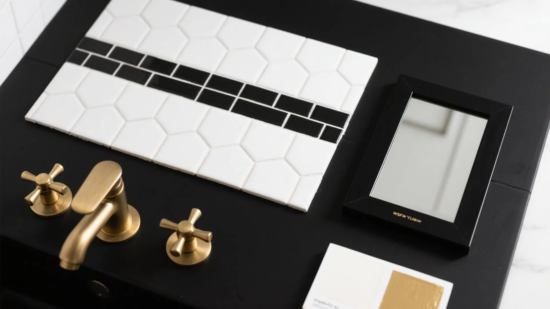 Flat lay of white tile, black grout, and matte gold fixtures for a balanced black-and-gold bathroom palette.