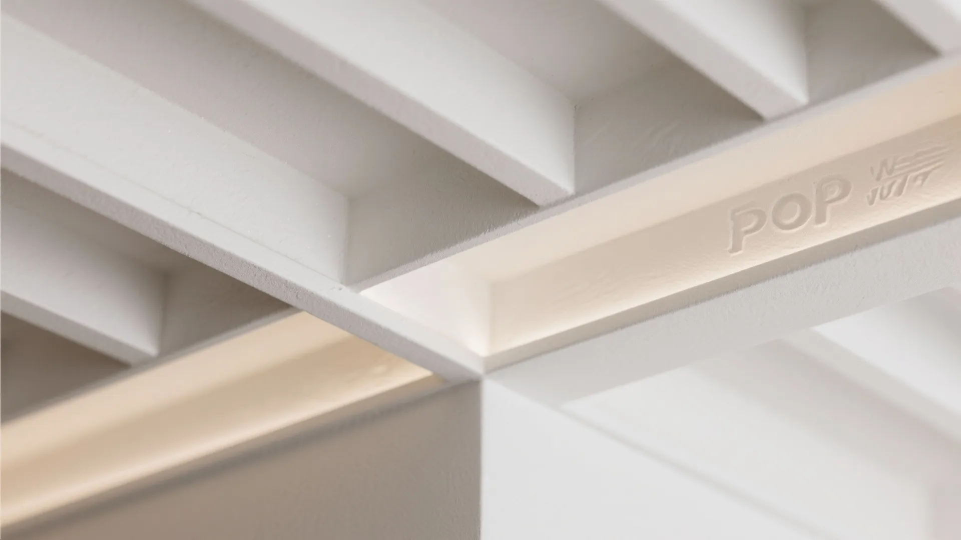 Geometric 3D ceiling panels to animate long halls