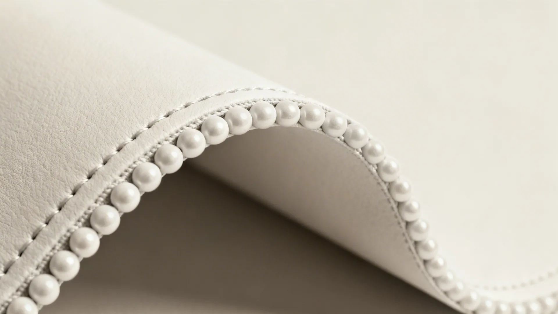 Macro of arch and panel molding illusion wallpaper with crisp profiles and matte finish.