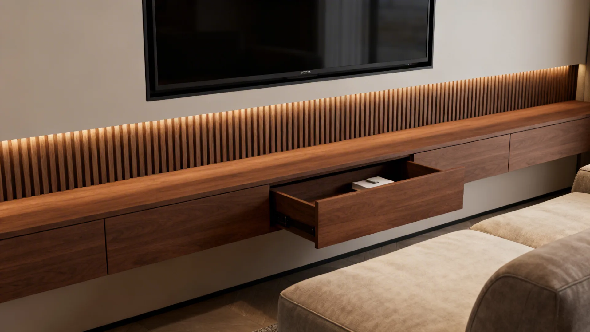 Slim walnut panel behind a wall-mounted TV with hidden drawers and integrated lighting.