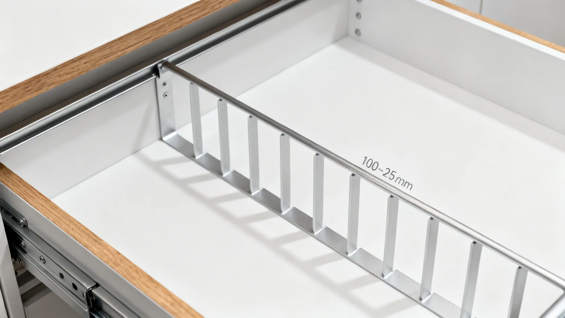 Macro of pantry pullout with neatly spaced dividers and oak-edged details.