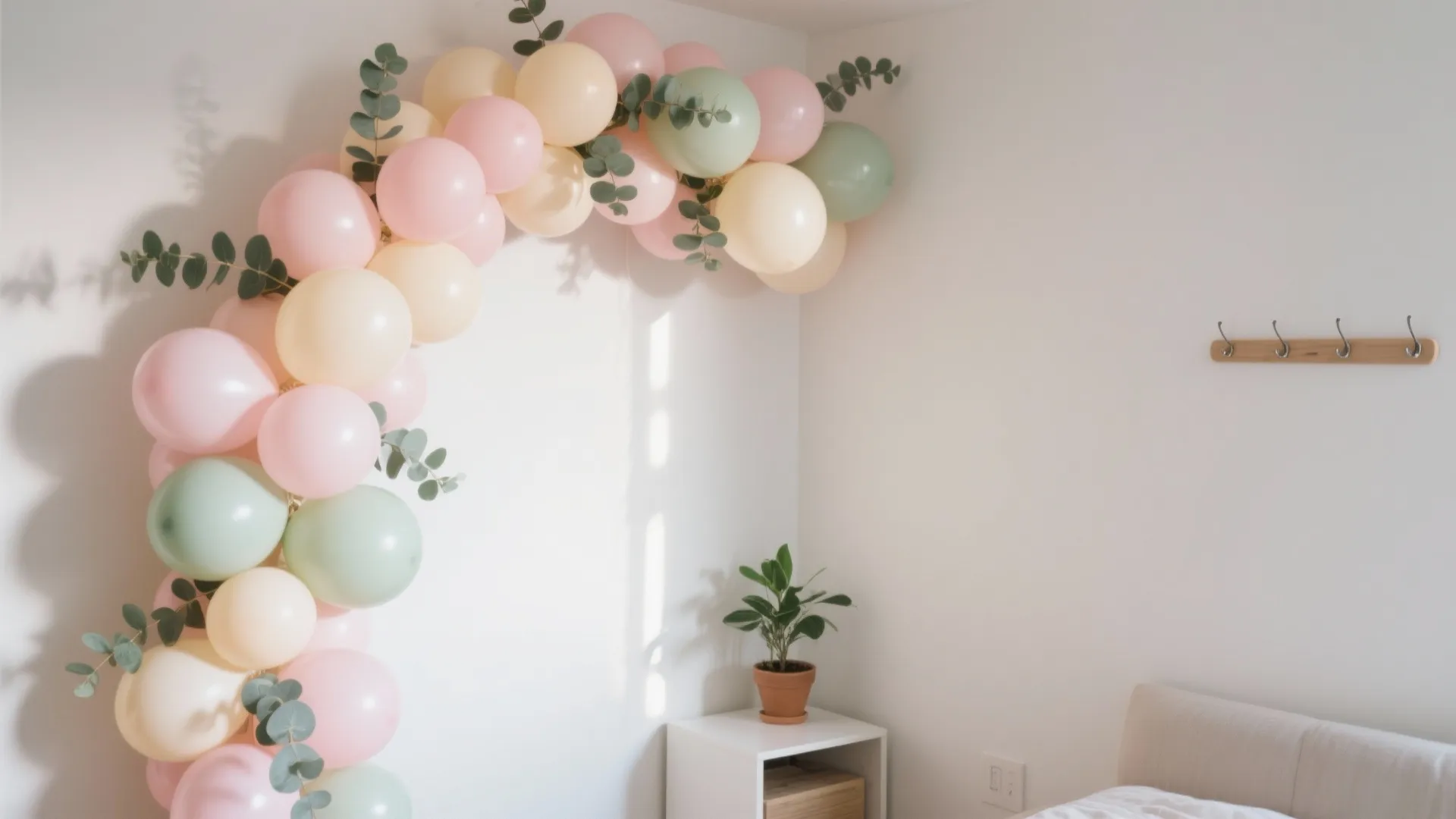 Soft Pastel Balloon Garland with Greenery