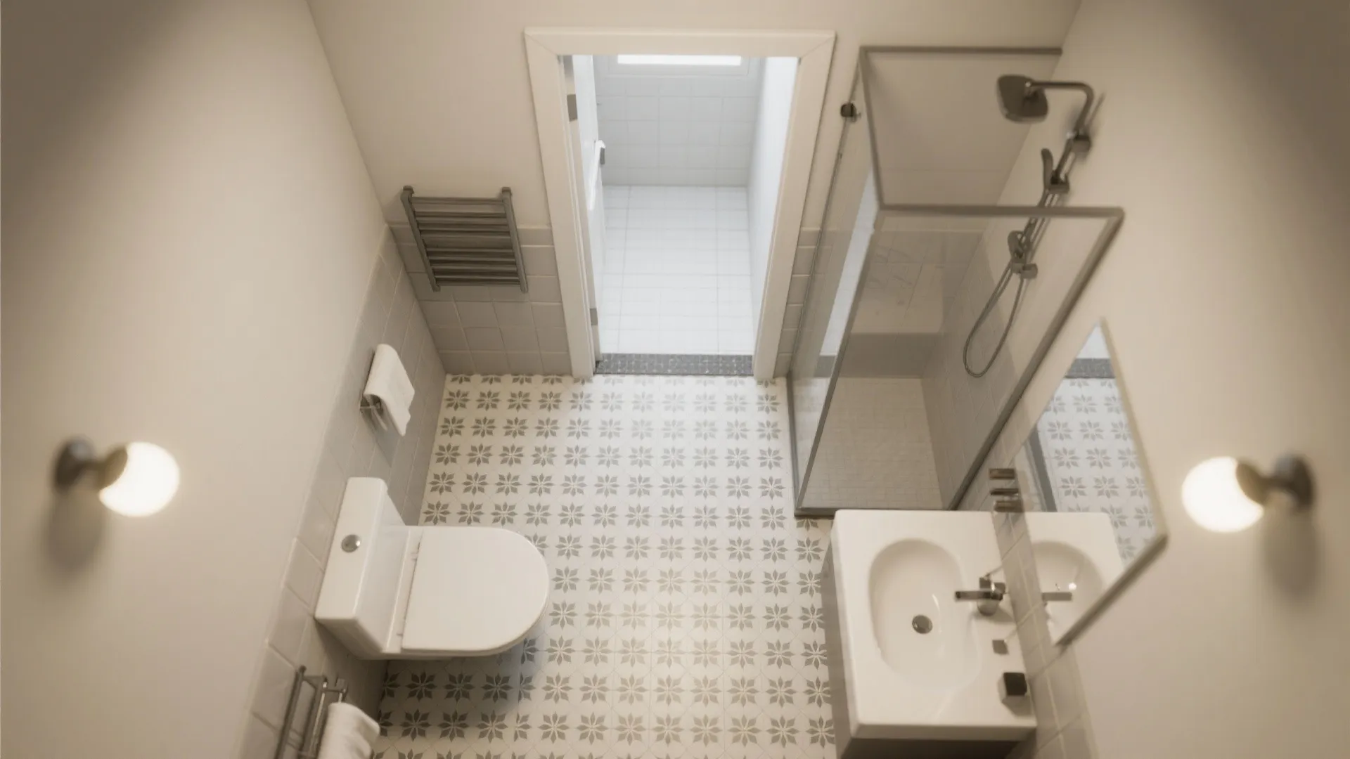 Top view of small bathroom with patterned floor tiles toilet white sink and glass shower