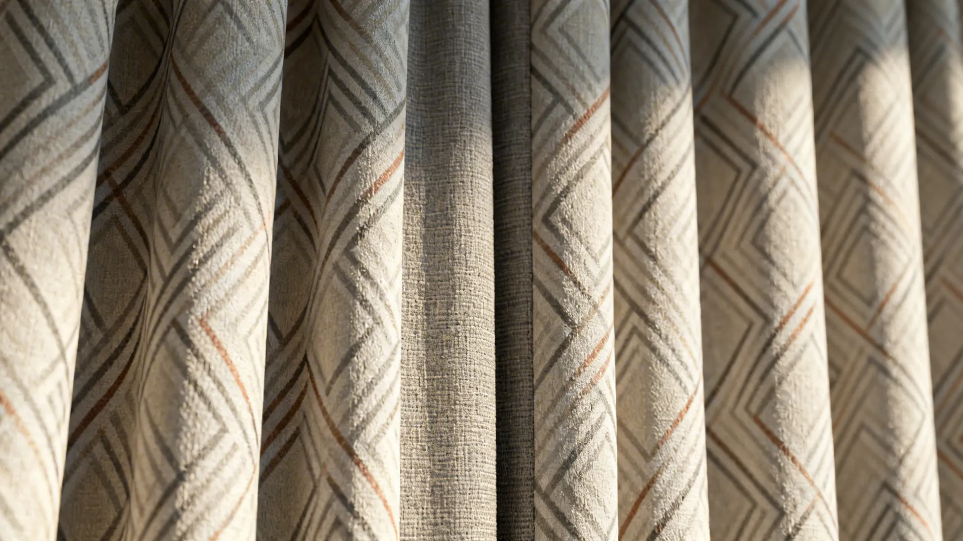 Subtle geometric printed blackout curtain fabric with dense lining and visible texture.