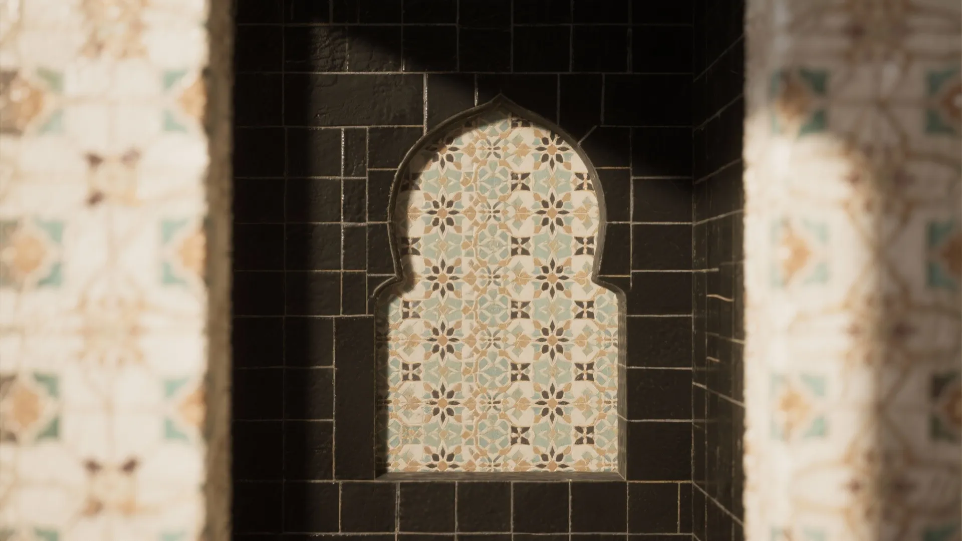 Arched wall niche featuring patterned floral tiles surrounded by dark square tiles with natural shadows