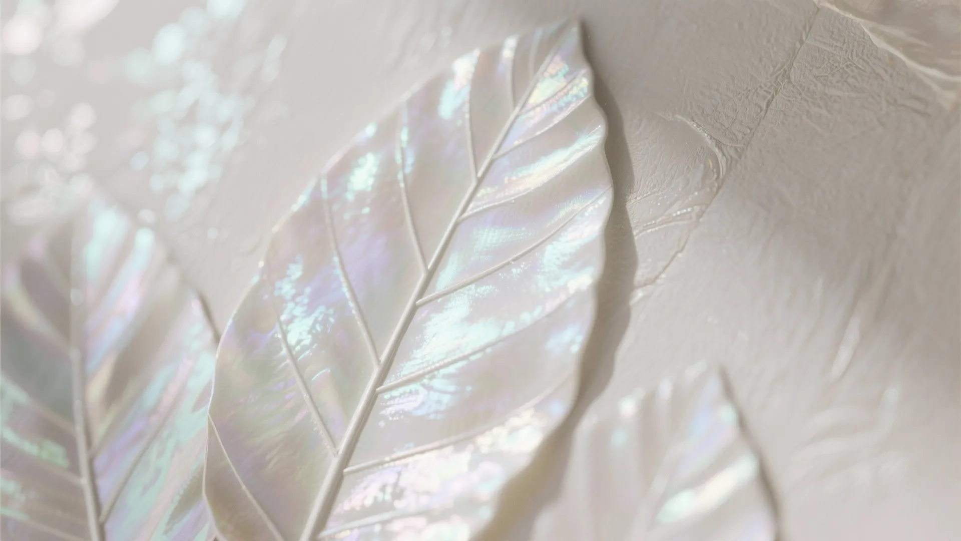 Close up of iridescent leaf wall panel decoration with shiny pearly finish and textured details