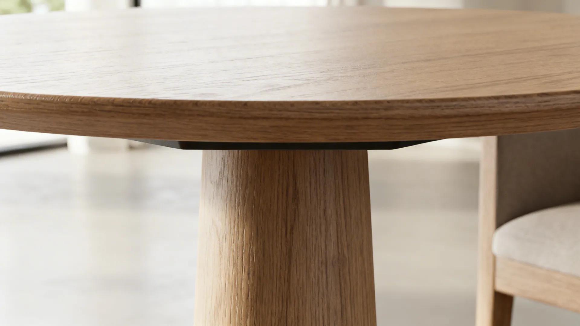 1. Slim pedestal round table for maximum legroom