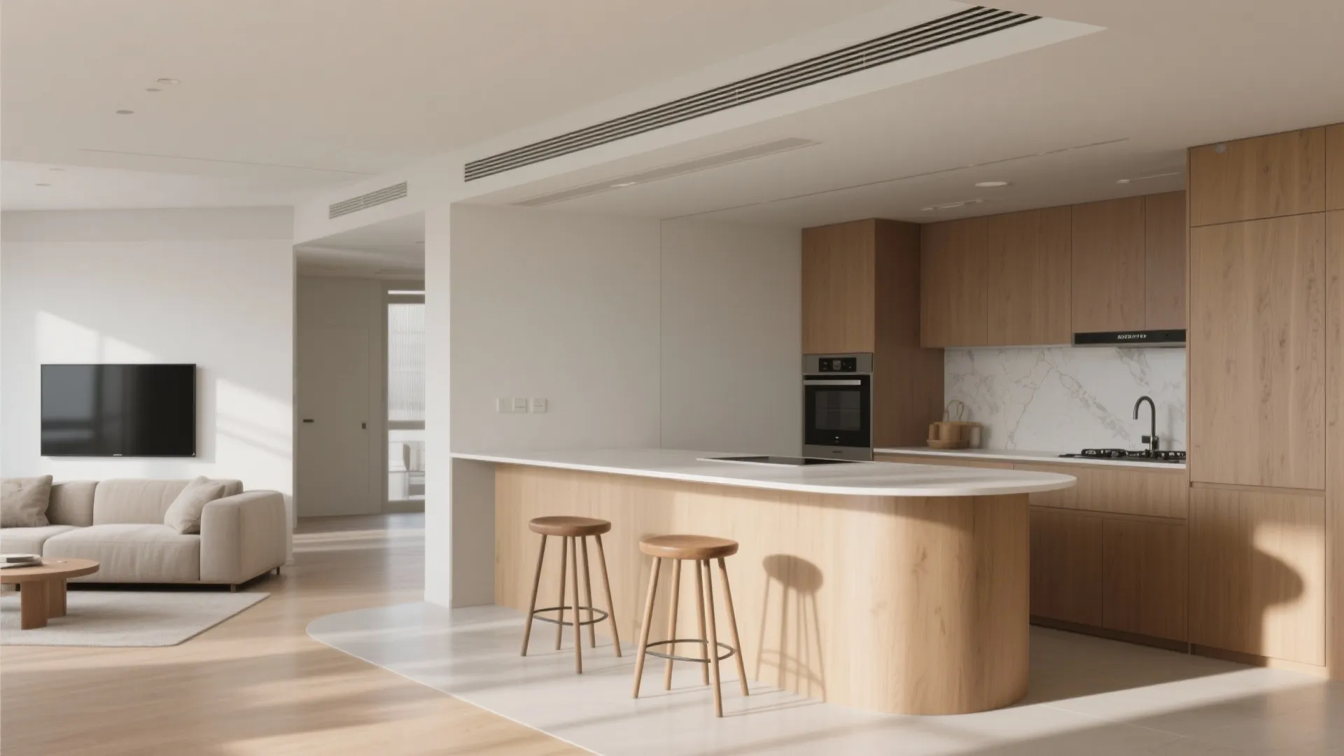 Slim peninsula with two stools creates a dining edge and zones the hall from the kitchen.