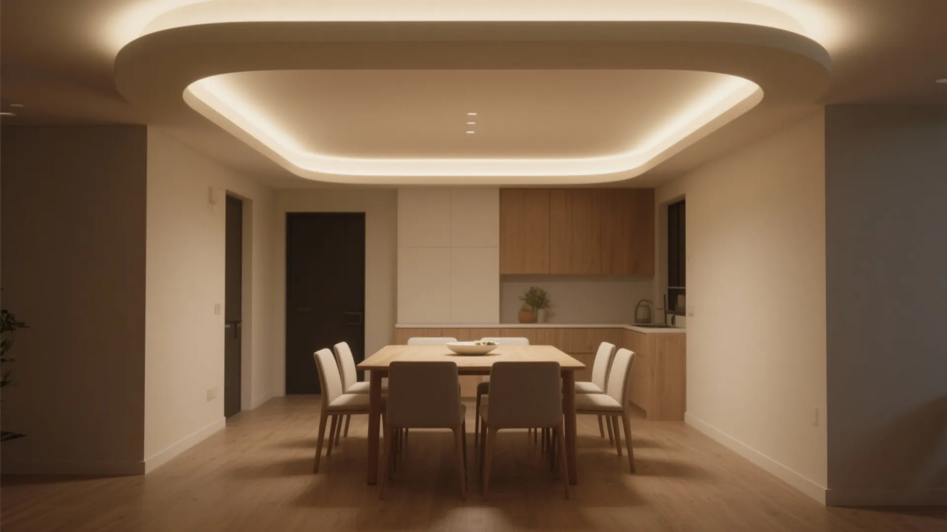 Dining room with perimeter cove lighting creating a floating-ceiling effect and soft wash.