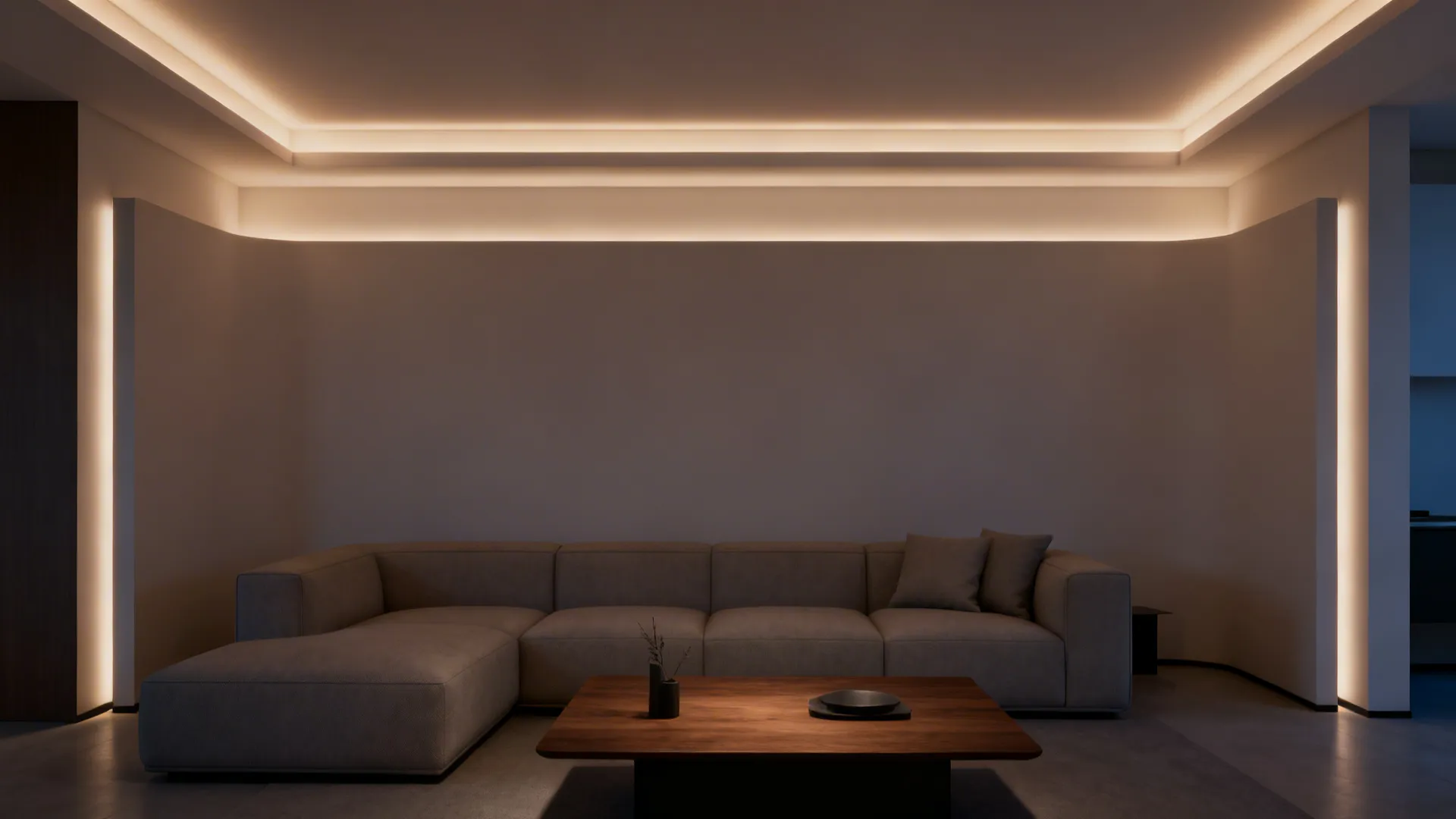 Ultra-slim perimeter tray ceiling with warm hidden LED glow in a small modern living room.
