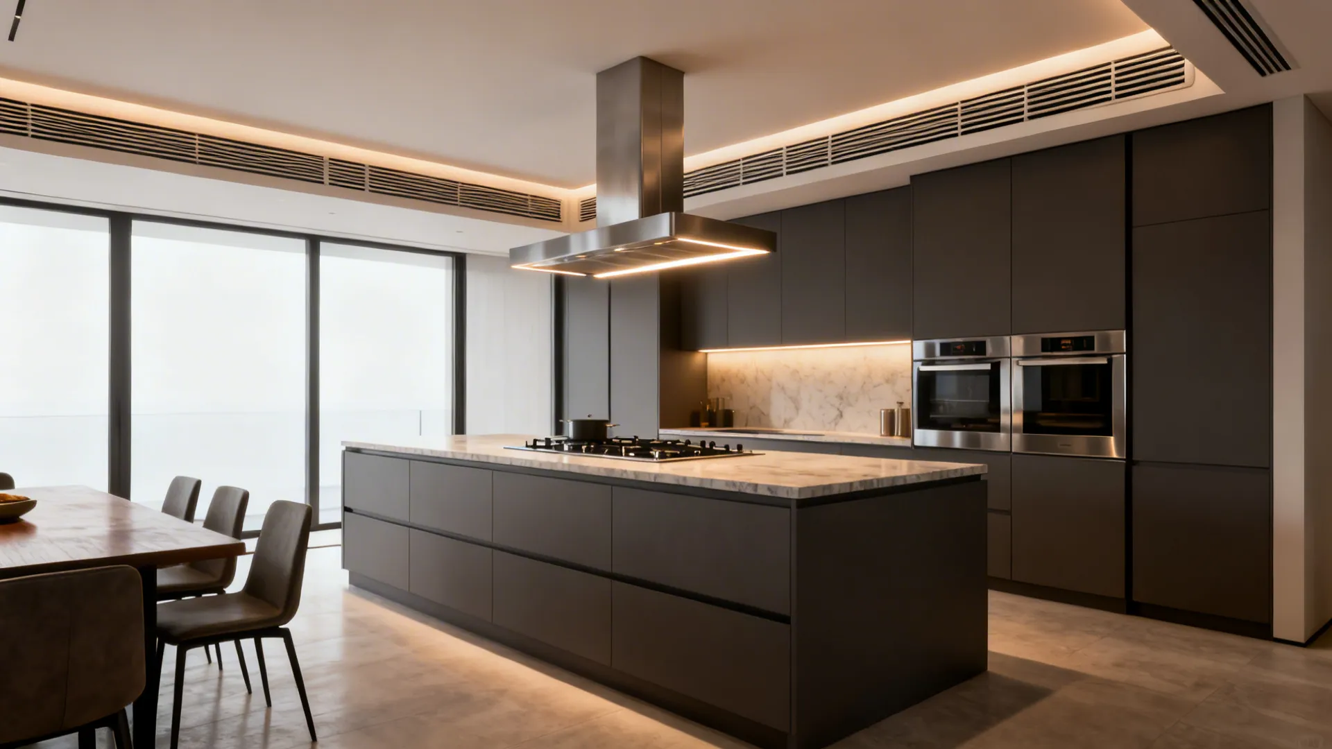 Modern kitchen with a dropped perimeter POP ceiling for ducts and a slim island plus with integrated lighting.