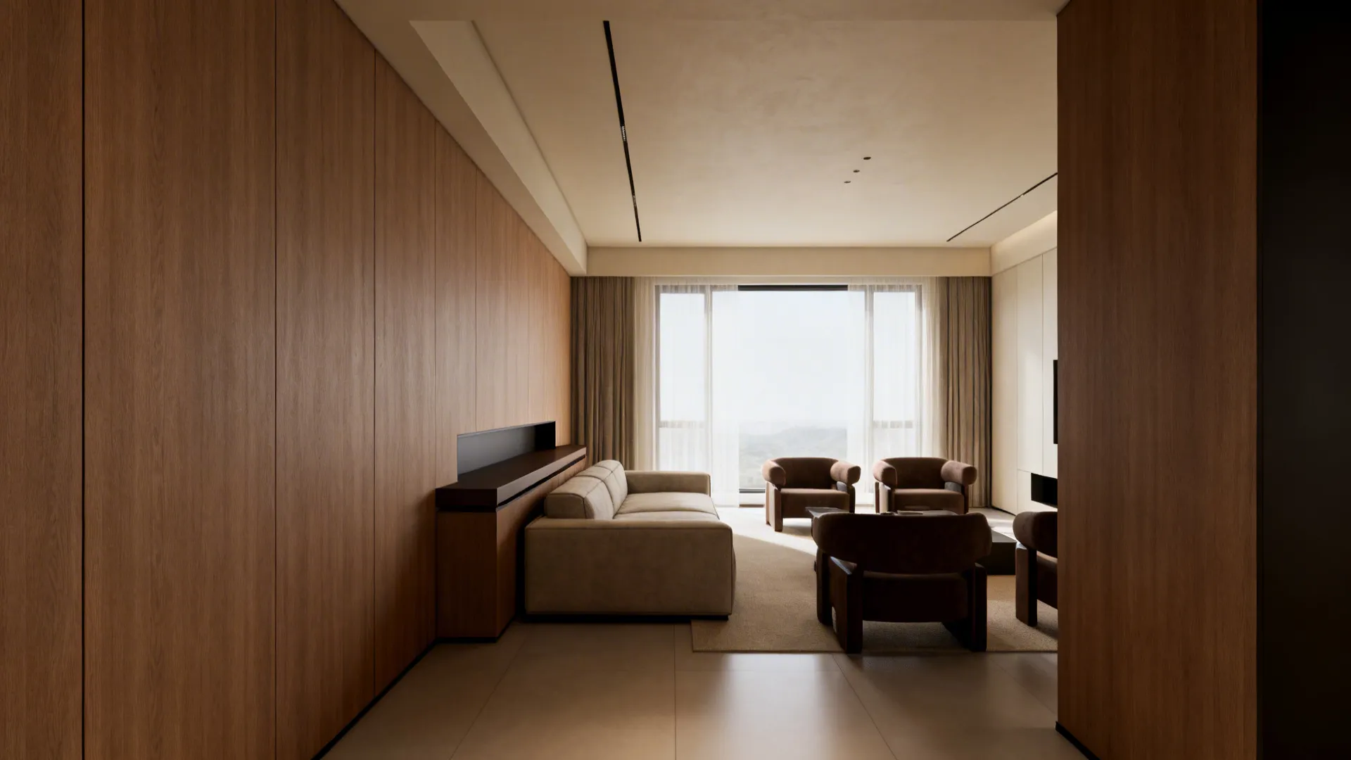 Sofa placed perpendicular to the long wall with narrow console behind, creating conversational layout.