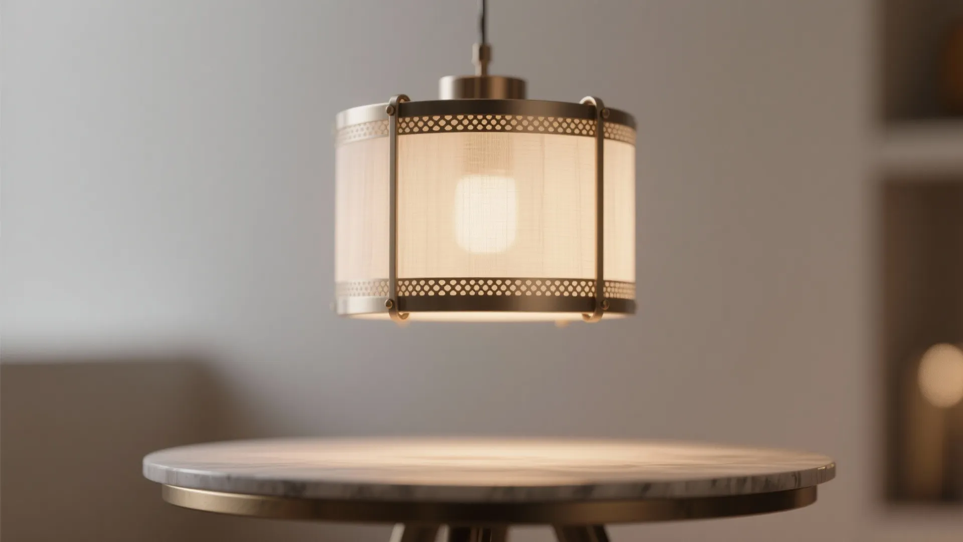 Modern drum ceiling light hanging over round marble dining table inside a neutral colored room