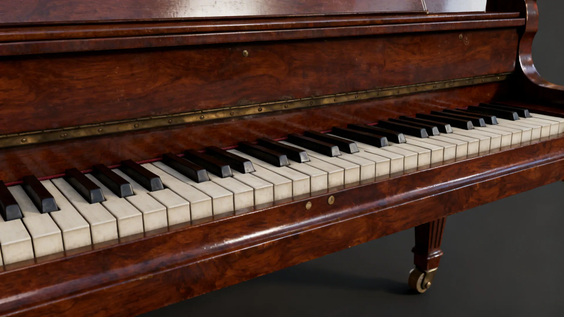 Close-up of piano finish, keys and felt pad demonstrating care details.