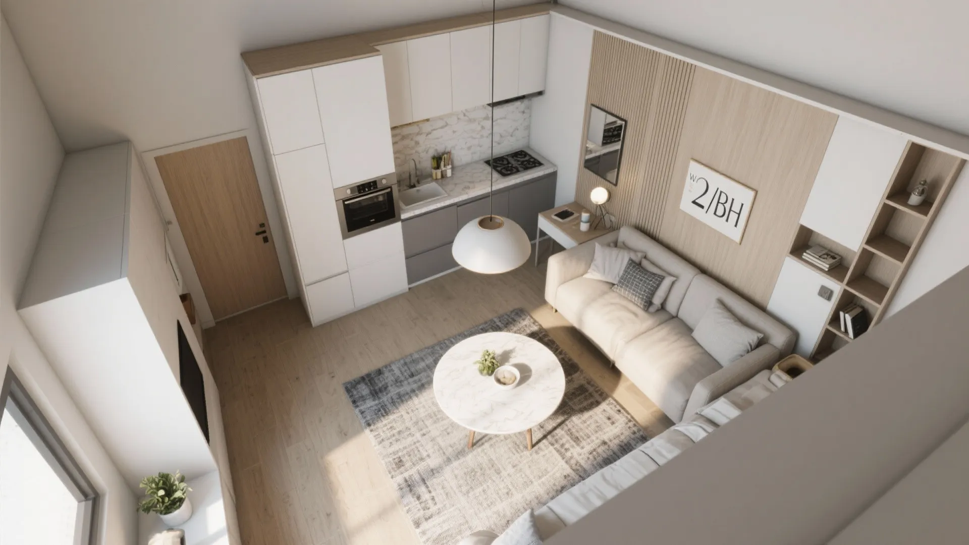 Top down view of small apartment showing kitchen white cabinets beige sofa and round coffee table