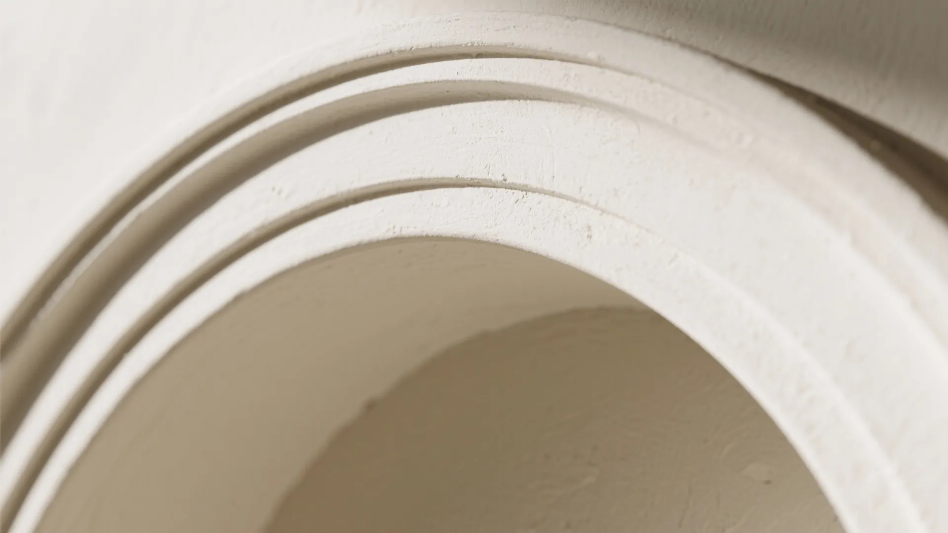 Soft Plaster Arch Entry to the Dining Hall