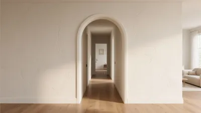 Soft Arched Hallway Design with Warm Tones