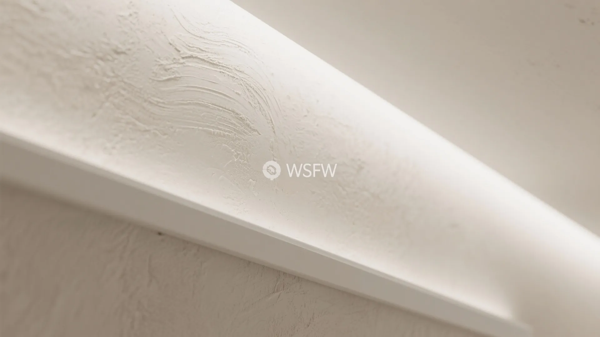 Macro of limewash plaster texture meeting a faux skylight recess with soft light gradient.
