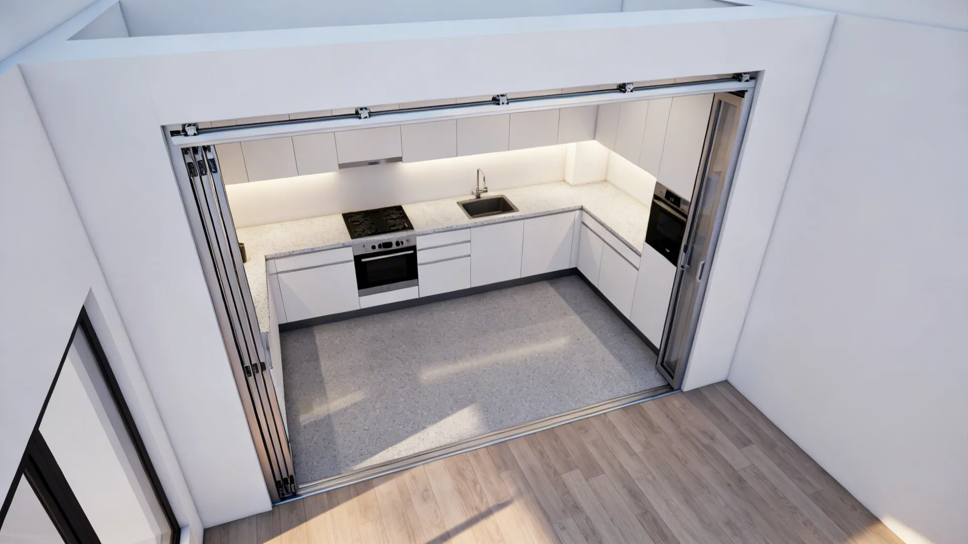 Top-down view of L-shaped kitchen showing aluminium pocket door that frees circulation space.