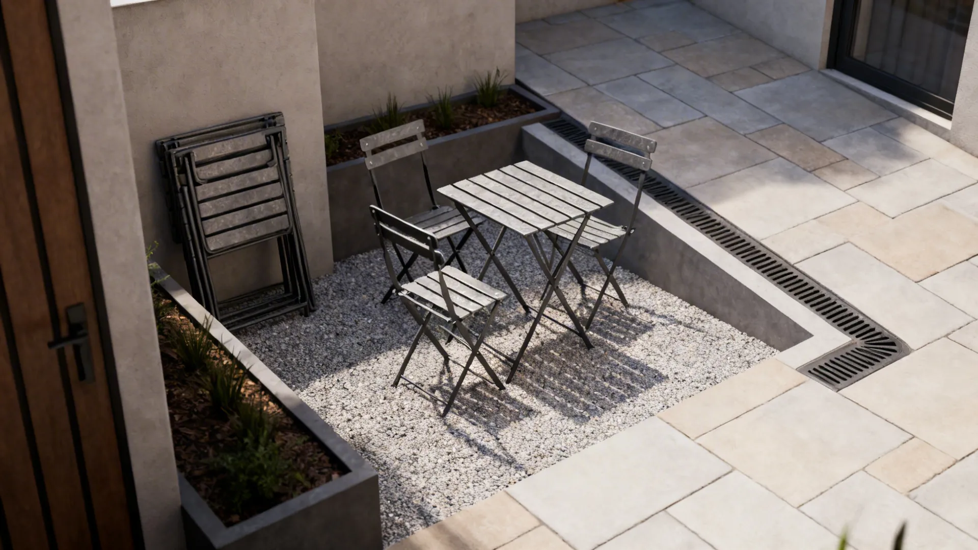 Pocket patio with folded bistro table, stackable chairs, and gravel paving in a tiny courtyard.