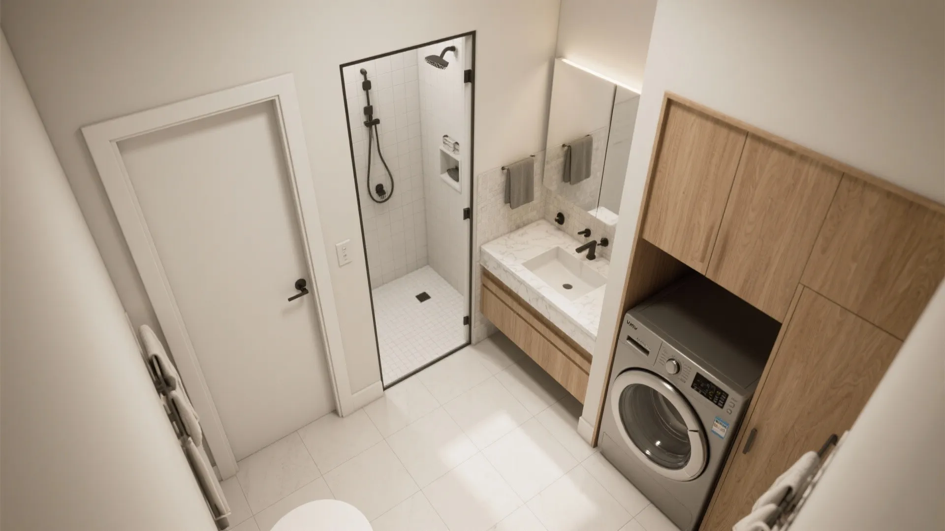 Top view of a small bathroom featuring white tile floor wooden vanity and silver washing machine