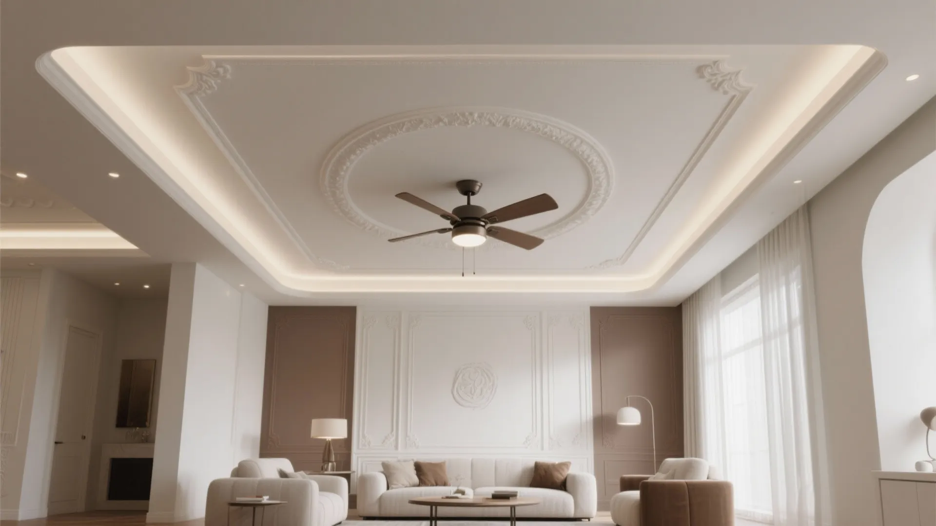 Elegant living room featuring a decorative ceiling fan with light above white sofas and furniture