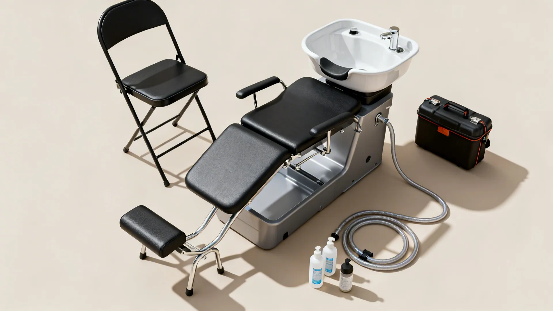 Flatlay of portable backwash chair, basin, hoses and carrying case for mobile shampooing