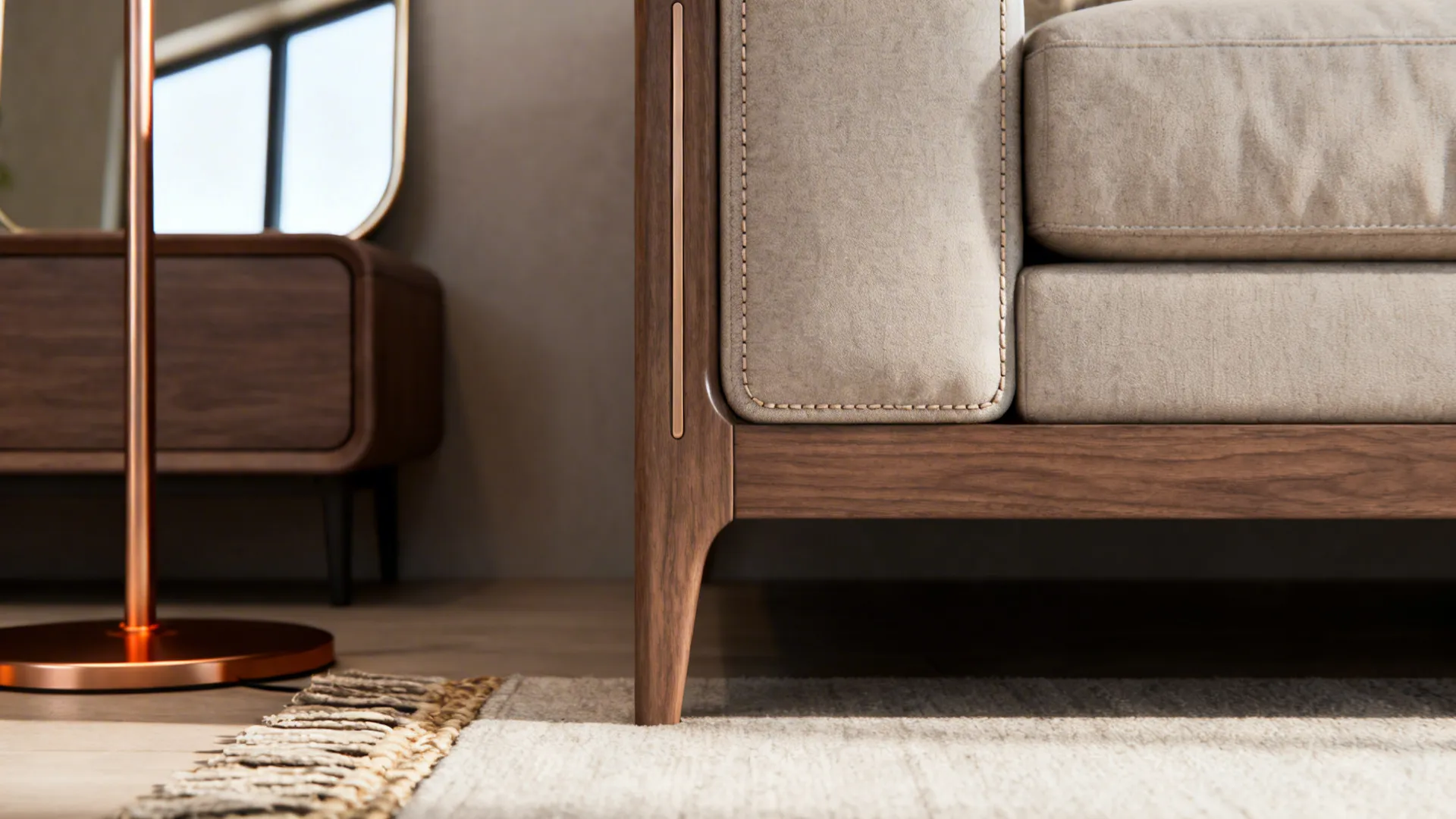 Close-up of slim sofa arm, low credenza, mirror and rug edge typical of narrow living room solutions.
